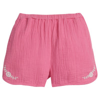 Girls/Tween hot pink gauze shorts that 
feature an elastic waistband and white embroidery detail on front of shorts as well. 