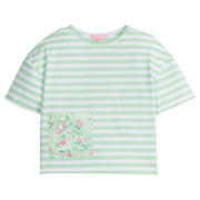 Girls/Tween light green stripe knit boxy tee with green floral pocket detail on front. 