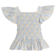 Girls/Tween woven top that has a ruching feature across middle of top. Top is made of yellow and white flowers printed on a light blue background and also features angel sleeves to complete the look. 