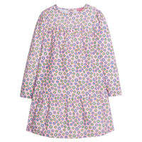 Girls/Tween woven dress in our Vienna Violets floral which contains an arrangement of purple/white/yellow flowers on a light pink background. Dress features a two-tier detail with button enclosures along the back-BISBY