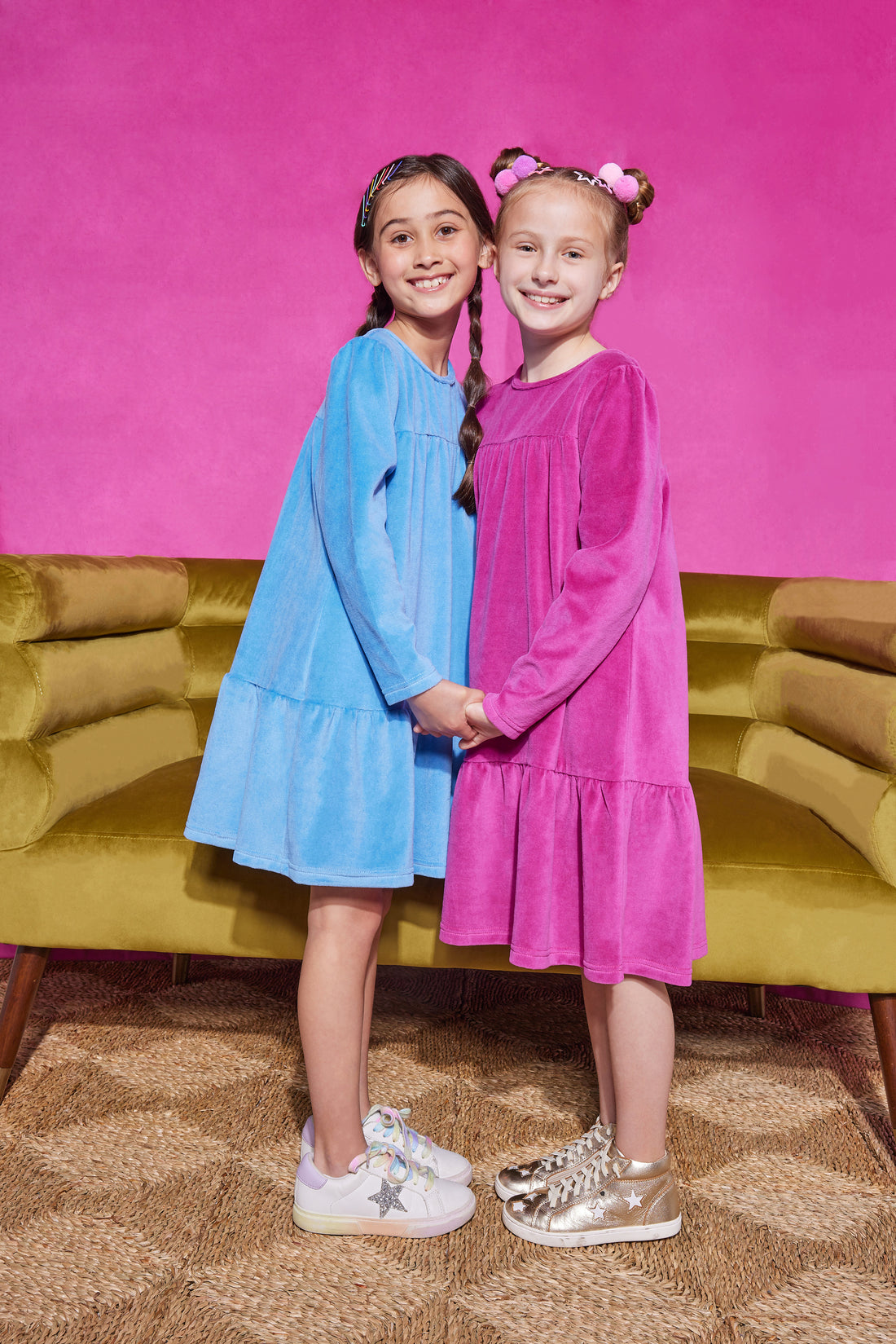 Girls/Tween velour dress in a French blue and Magenta color. Dress has button closures along the back, but made of a soft stretchy velour for a secure but comfy fit.