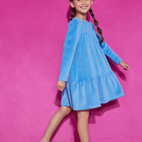 Girls/Tween velour dress in a French blue color. Dress has button closures along the back, but made of a soft stretchy velour for a secure but comfy fit.