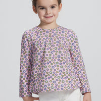 Girl/Tween woven long sleeve top in a pink/purple/yellow floral pattern. Top features button closures along back for a relaxed but secure fit.