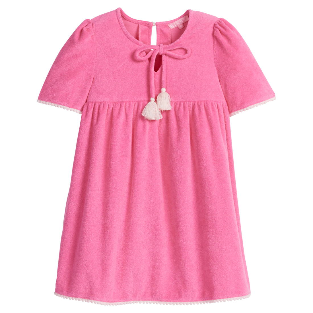 Girls/Tween hot pink terry cloth dress that features a slight v-neckline, light pink pom pom detail at sleeves, and tie tassels at top of neckline. There is also a button closure at back for a relaxed but secure fit. 