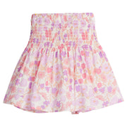 Girls/Tween woven skirt with ruching across top half in a lavender/coral/pink floral print. 