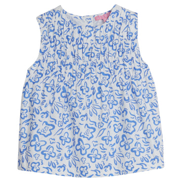 Girls/Tween sleeveless woven top in a blue and white floral print. Top features ruching at the bust and fans out for a relaxed comfy fit. 